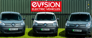 Fleet of Renault Kangoo Vnas in front of EVision Sign